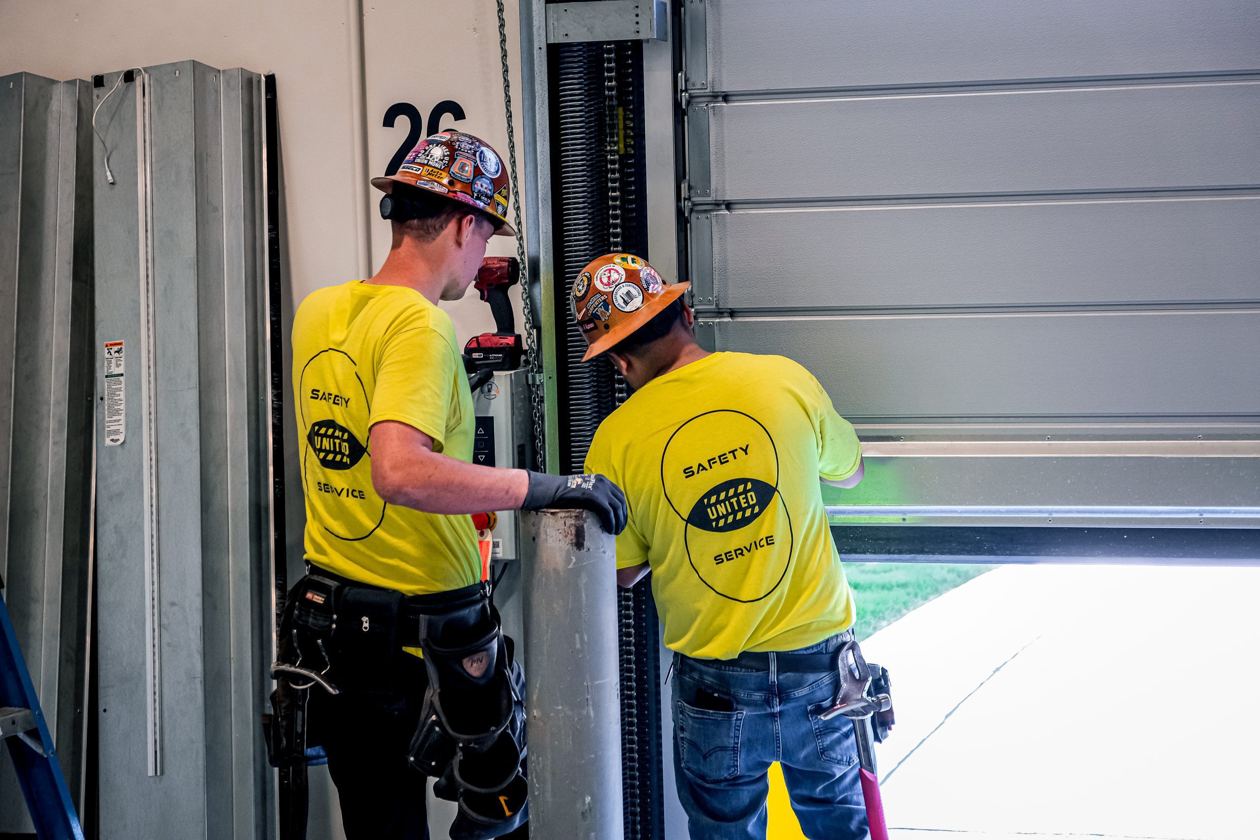 United Door And Dock Team Working On High-Speed Door at Pace Bus Facility